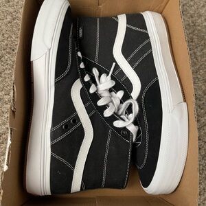 Vans Men's Classic Black and White High-Top Sneakers